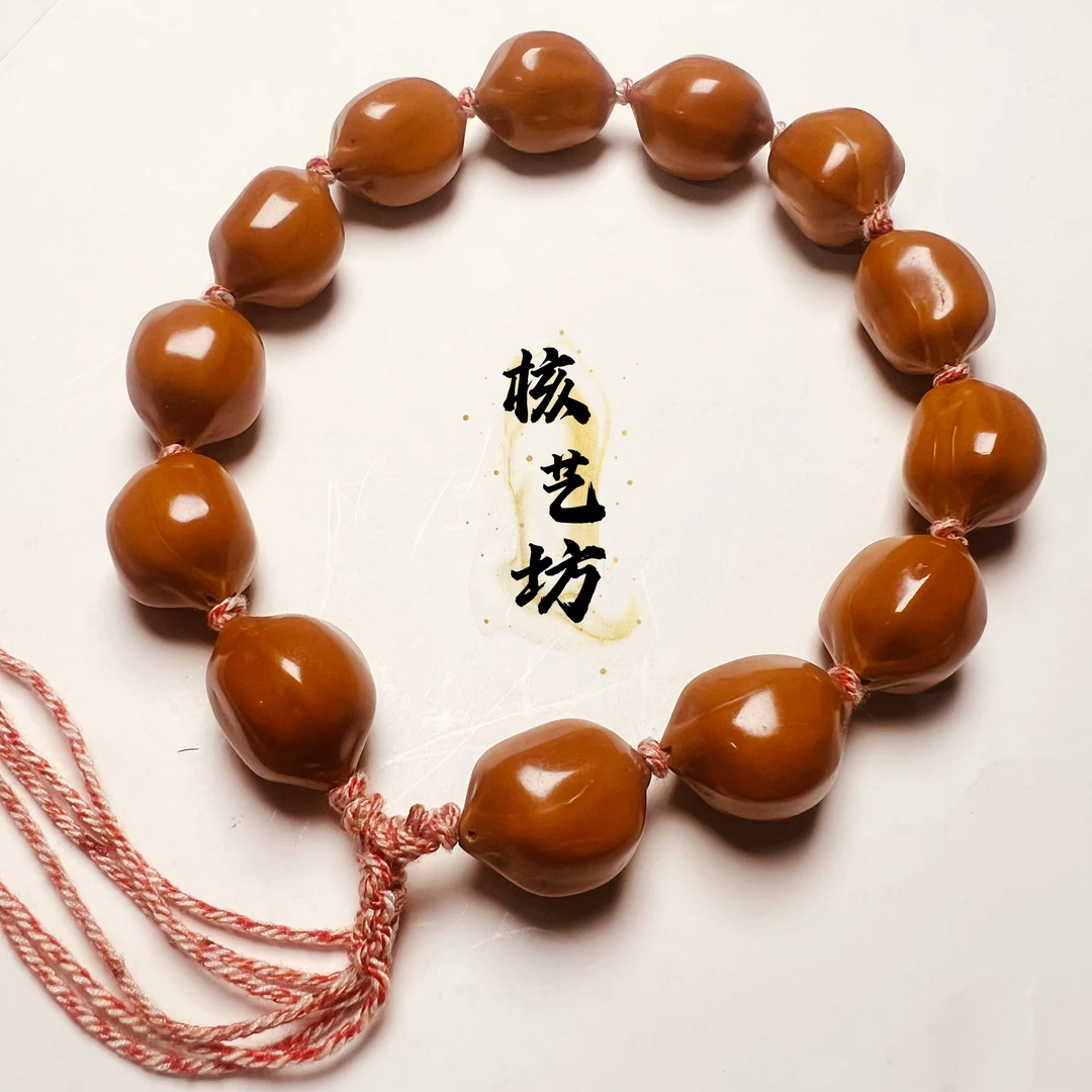 1.5精抛小蒜头橄榄核素核手串-W