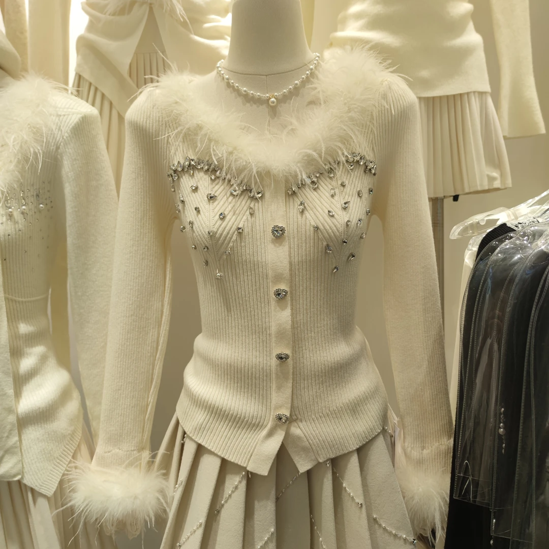 669秋冬新款法式轻奢重工钉钻仙仙羽毛设计感修身显瘦针织上衣