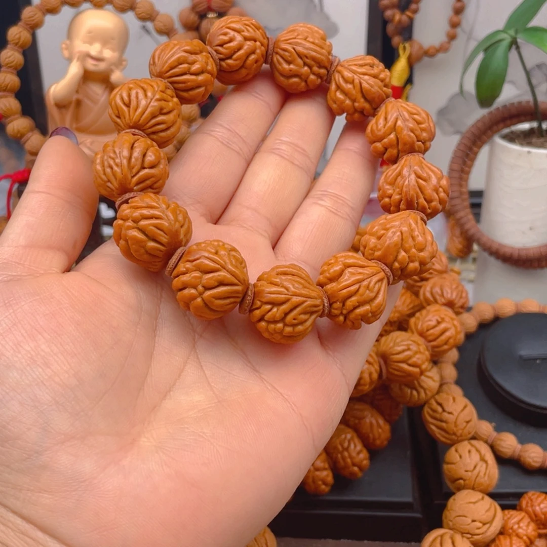 雨***沾吊坠桃核红红火火。红红火火