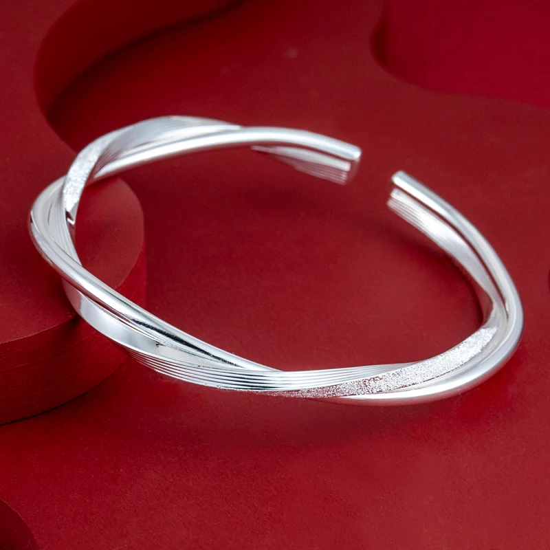 足银手镯 足银999莫比乌斯银手镯女年轻款交叉喷砂纯银镯子送女友
