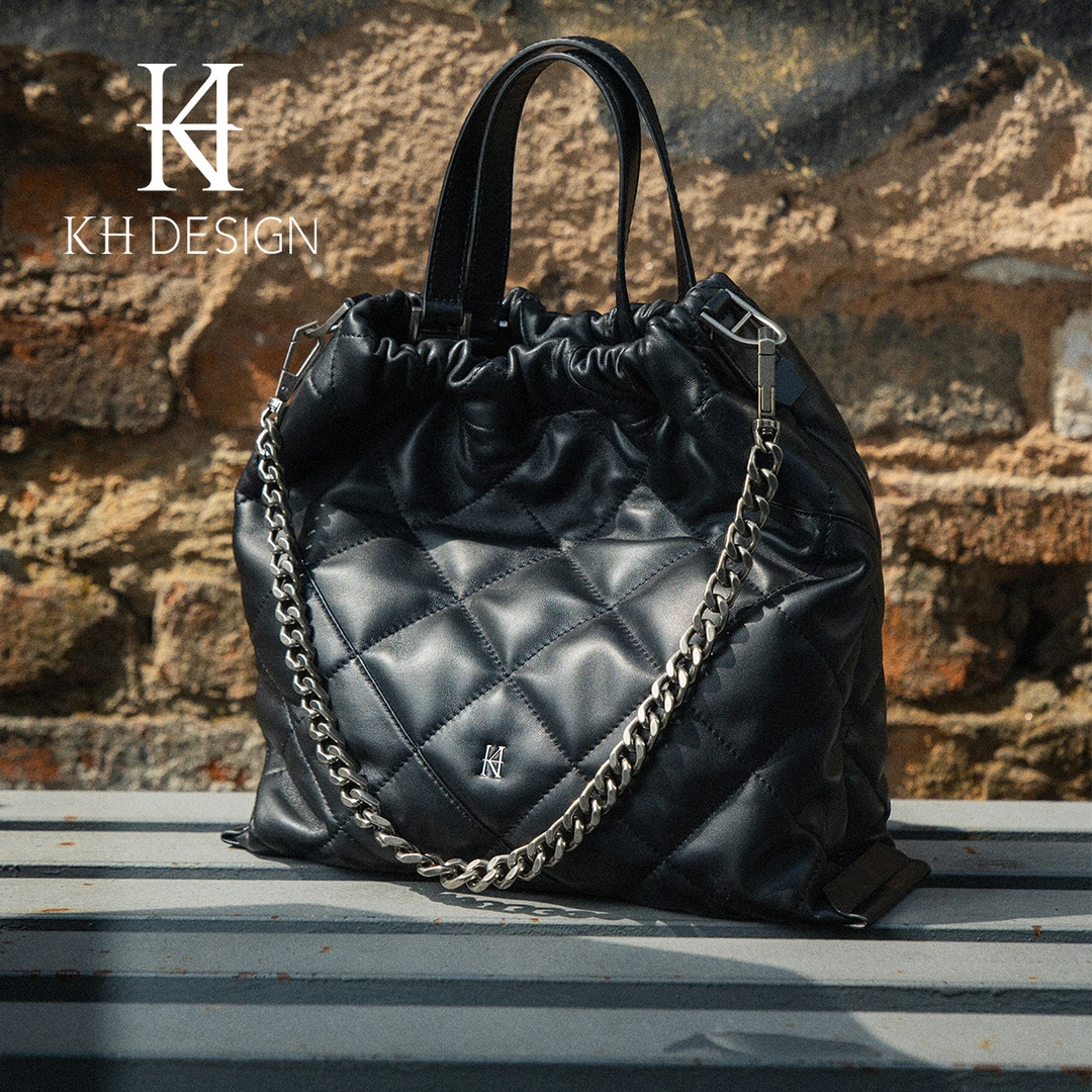 明治女包羊皮菱格垃圾袋大容量小香风流浪包手提水桶包TMK1679