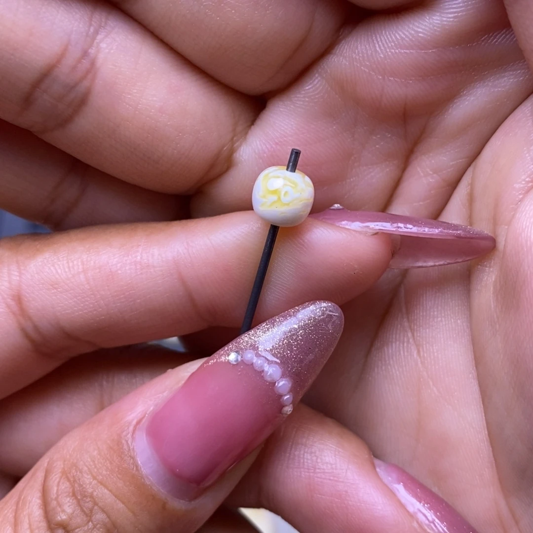 琥珀未镶嵌珠宝奇石瓷白溶洞妖花老型7*6.3mm