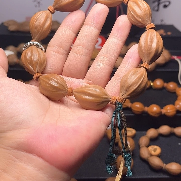 手串橄榄核老四花 18.28