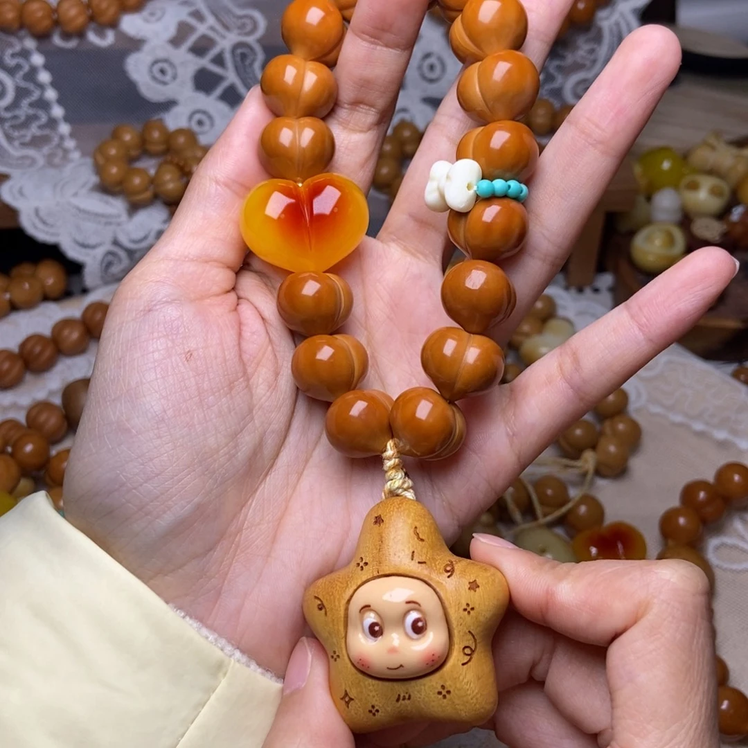 吊坠猴头核桃屁桃玻璃底卡15