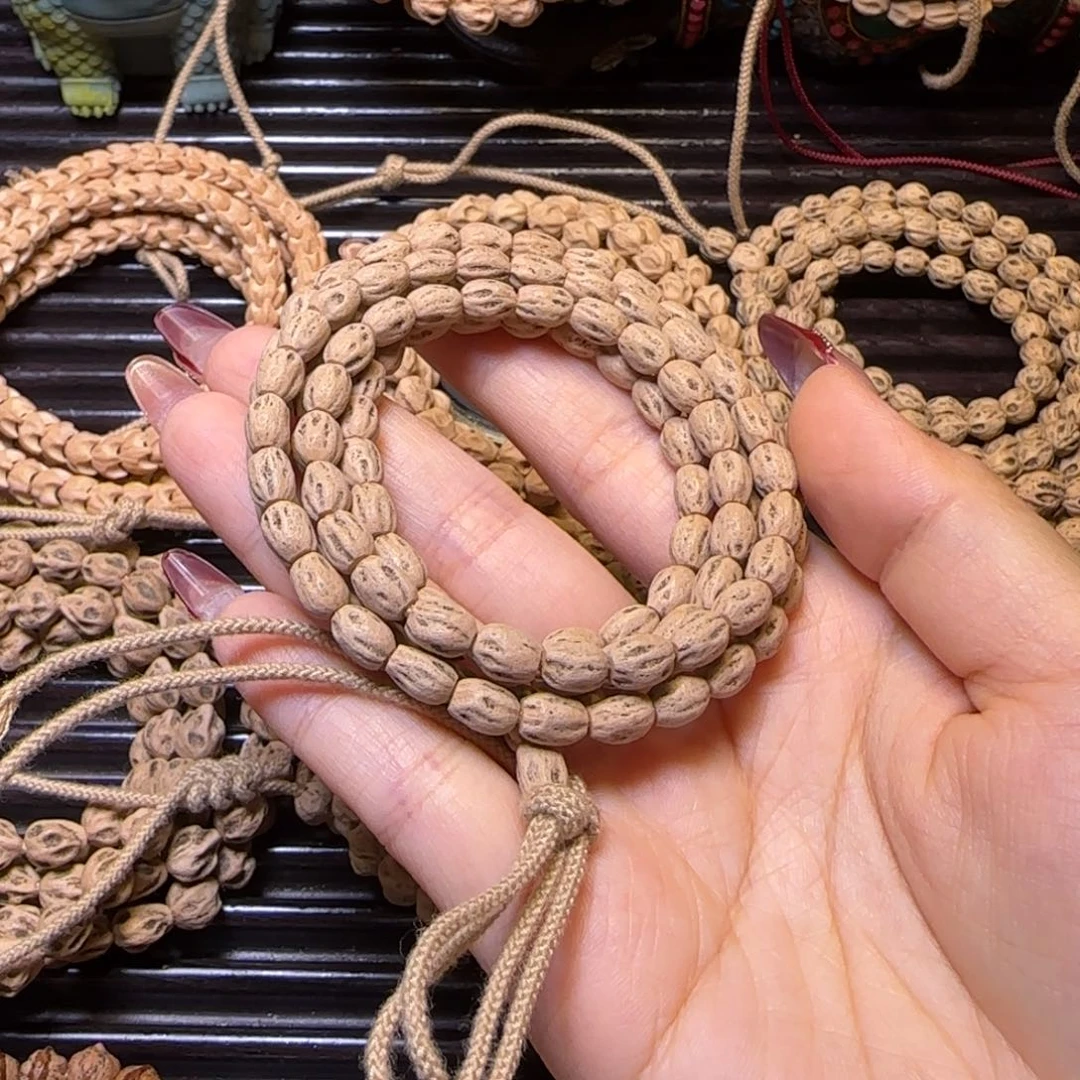 柏香籽/百香籽吊坠潘****铺