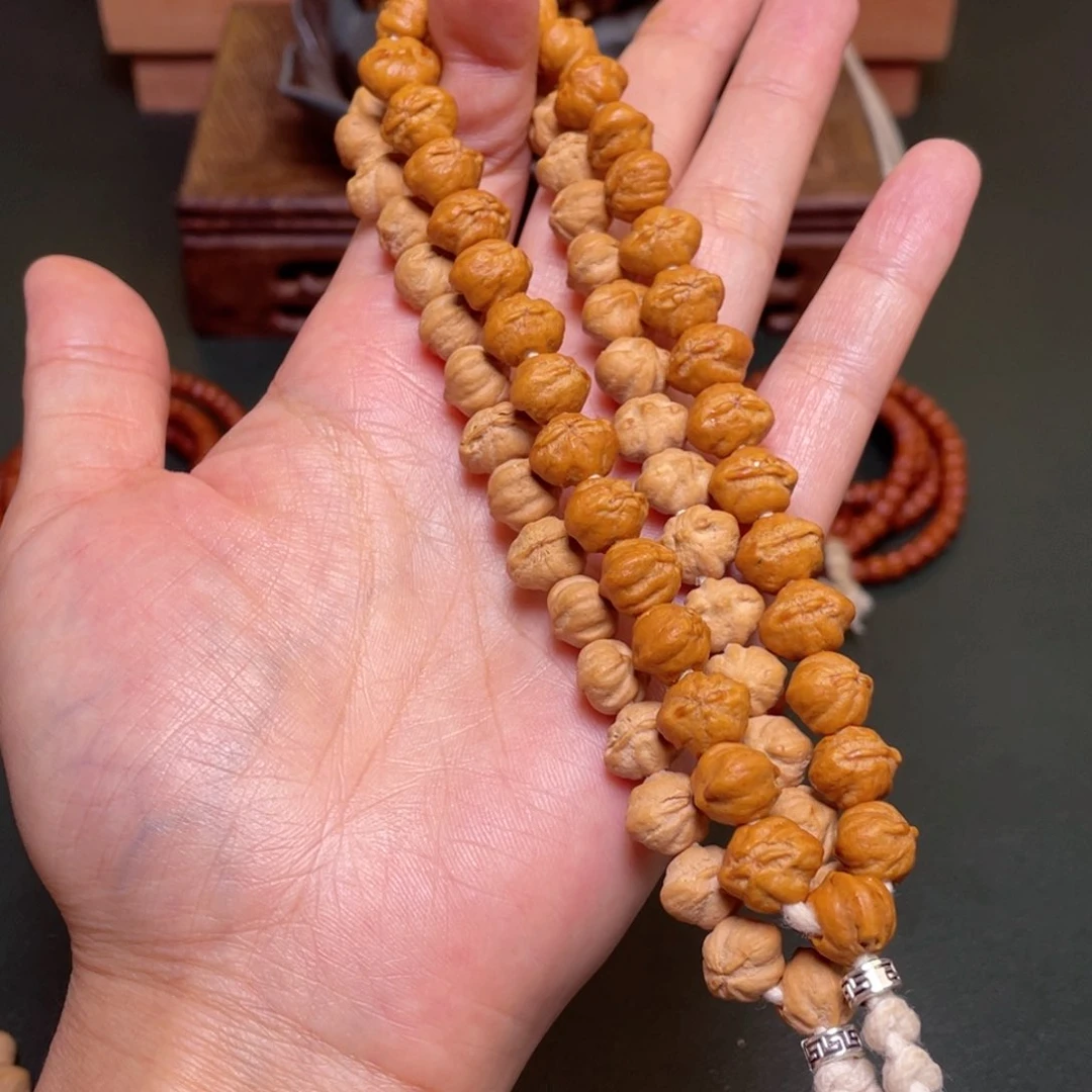 柏香籽/百香籽吊坠旺仔手持