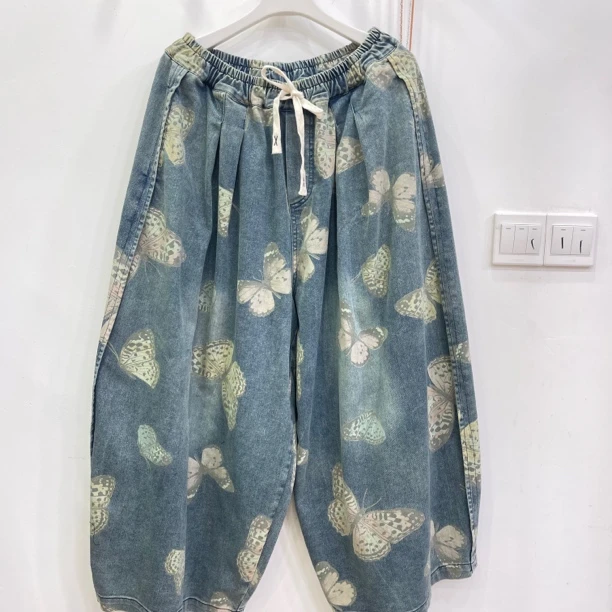 486大蝴蝶牛仔八分大版女裤
