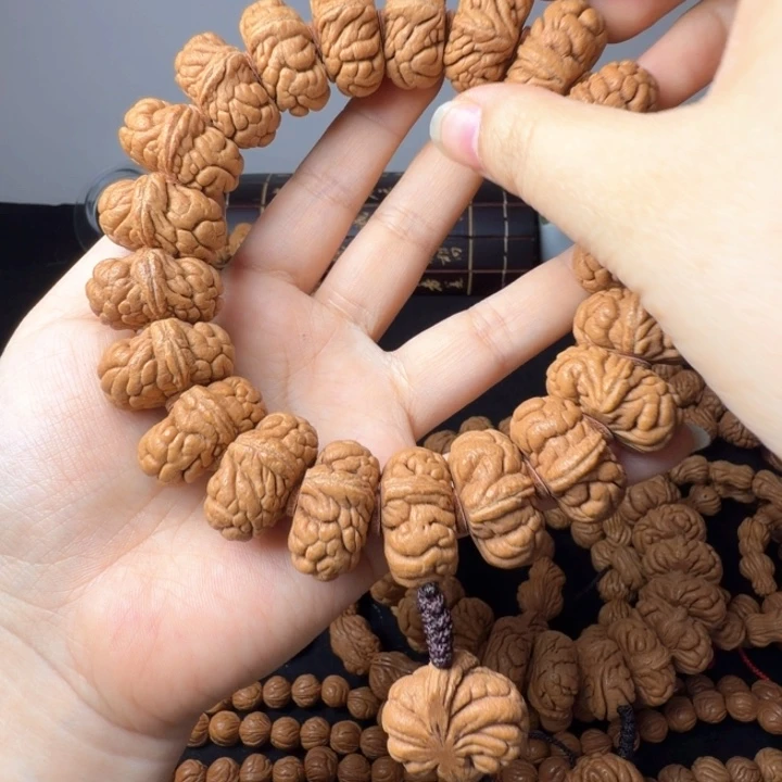 沉***詩桃核吊坠霸王龙手持