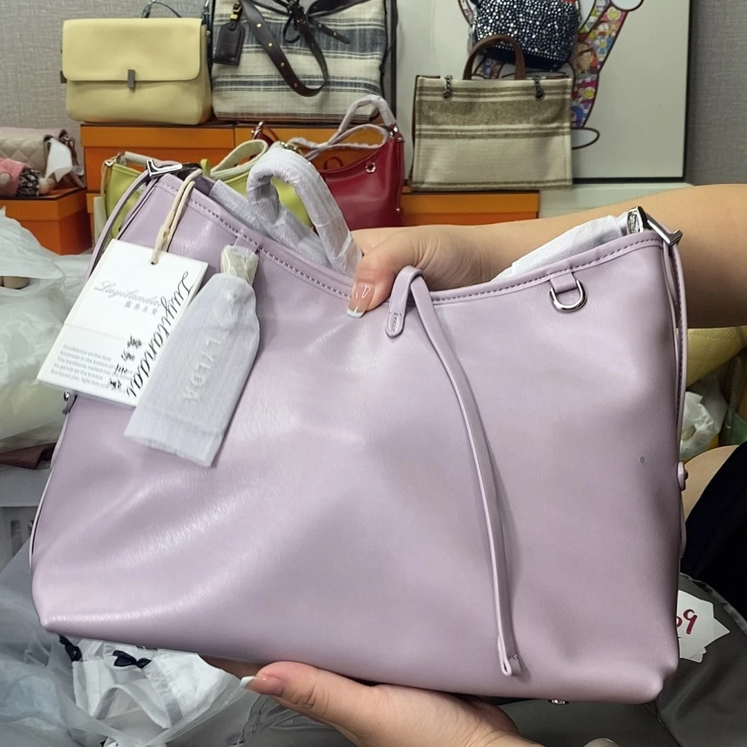 牛皮（革）广州小众品牌包包 带挂件