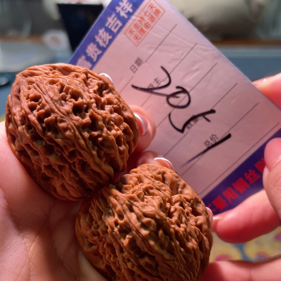 欧***柯核桃把件37边42桩高炮溜肩三角魔瞳涿鹿南将石