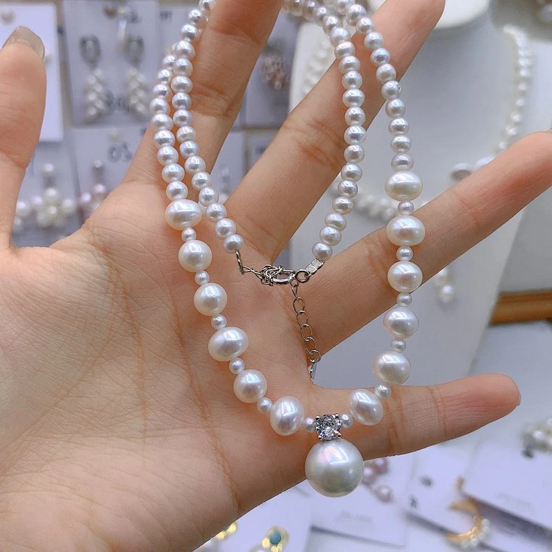 银S925镶嵌淡水珍珠耳饰夏**风