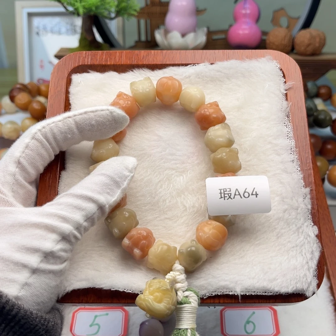 菩提根/象牙果手串14mm兔子手持一串瑕A64