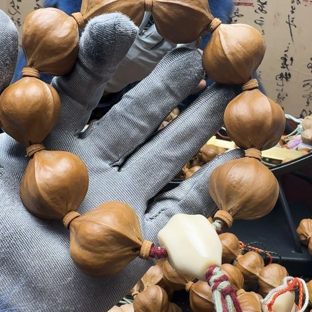 浩***成橄榄核手串精品大四花