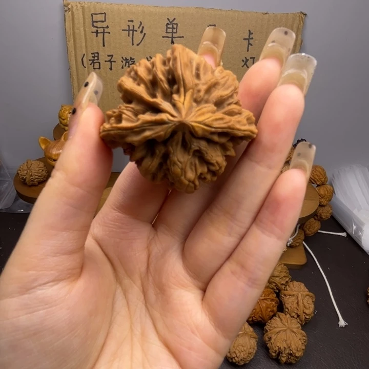 喵***喵桃核吊坠状元冠单只异型有瑕有黄