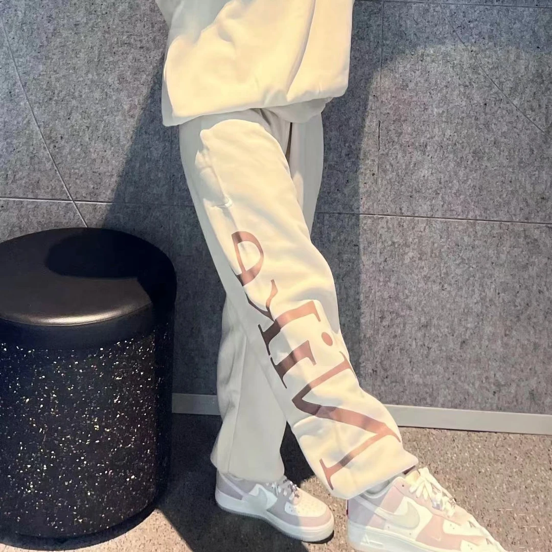 Nike/耐克正品春季新款女士宽松针织加绒束脚长裤FN2553-104