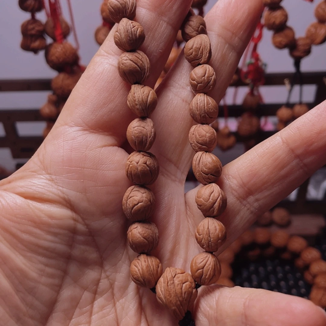 木质类龙纹桃枭手串