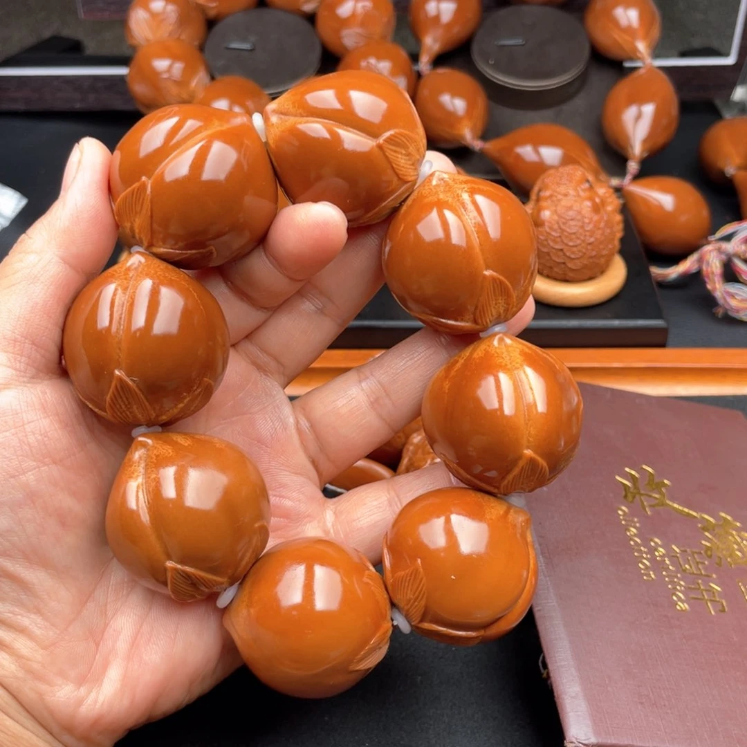 把件橄榄核寿桃手持