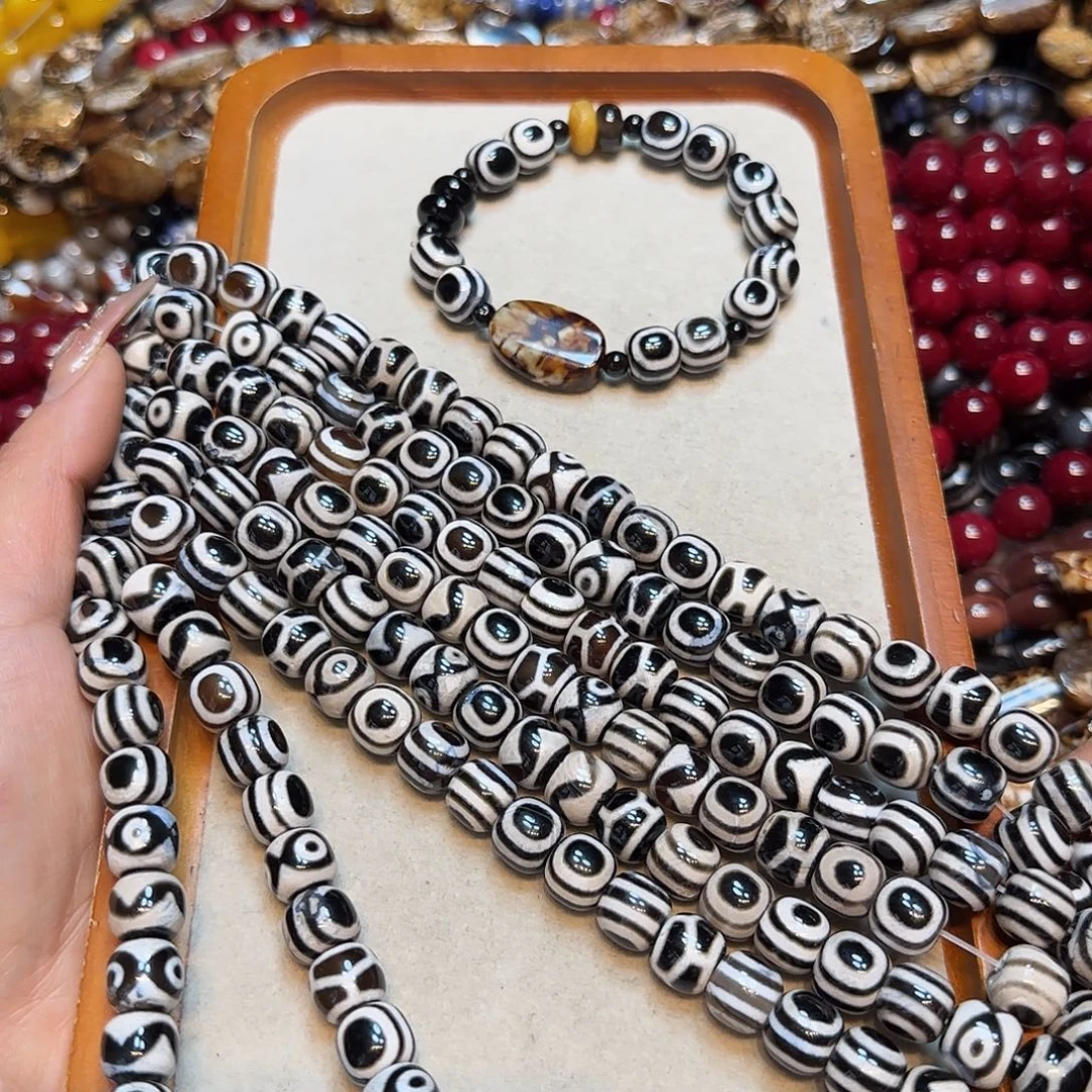 玛瑙/玉髓未镶嵌珠宝半成品10mm板眼玛瑙天珠一条