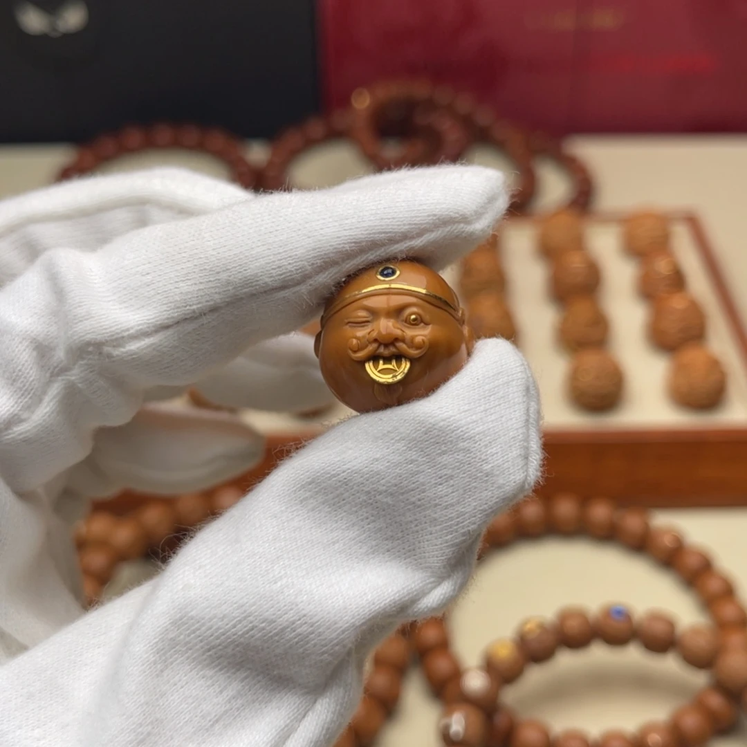 猴头核桃吊坠长****丶金币财神