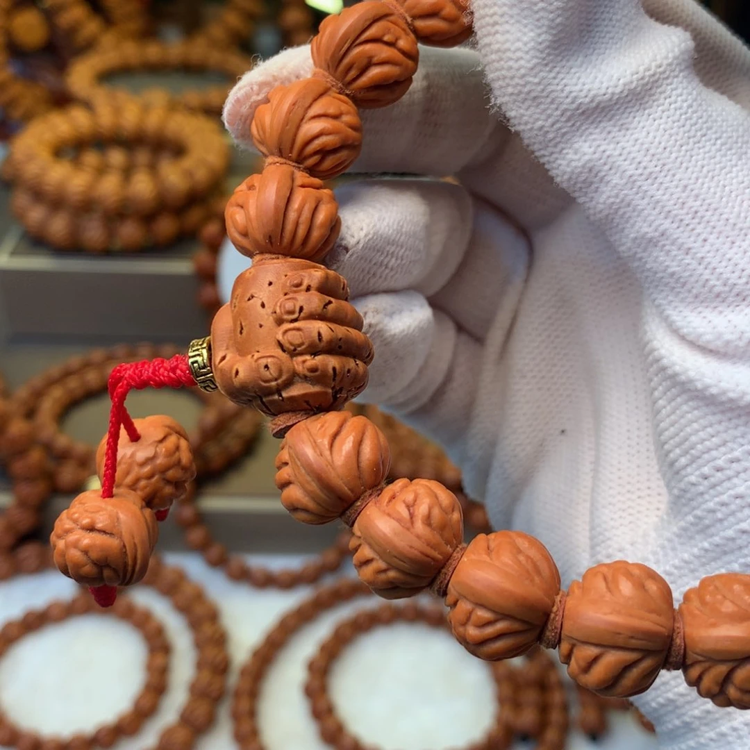 桃核手串吾*安秦岭龙纹