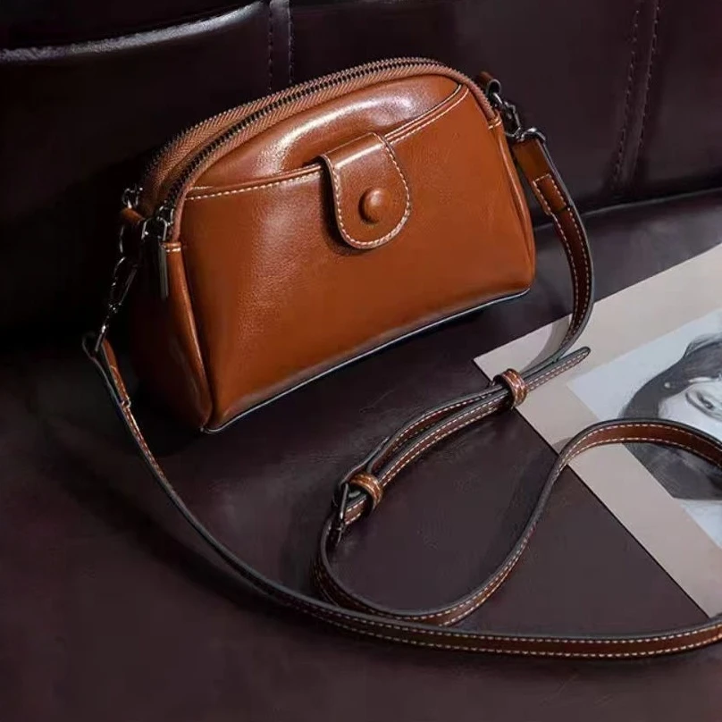 03274  张十柒服饰真皮女士手机包单肩包斜挎包