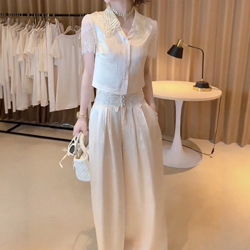 中国风洋气印花扎染套装女夏季新款蕾丝翻领短款衬衫阔腿裤两件套