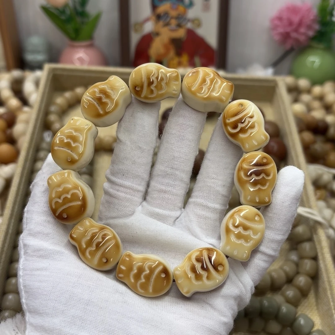 吊坠菩提根/象牙果牙果瑕疵机抛315