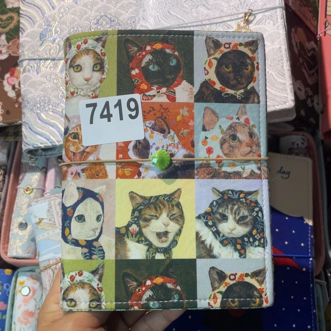 啊***a织绣奇葩A6活页加1份空白和1份方格7419