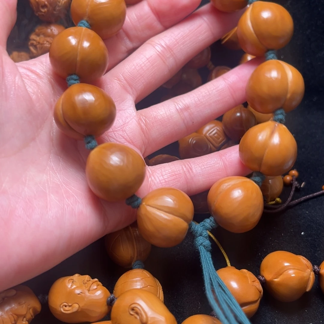 一***华橄榄核吊坠屁桃21