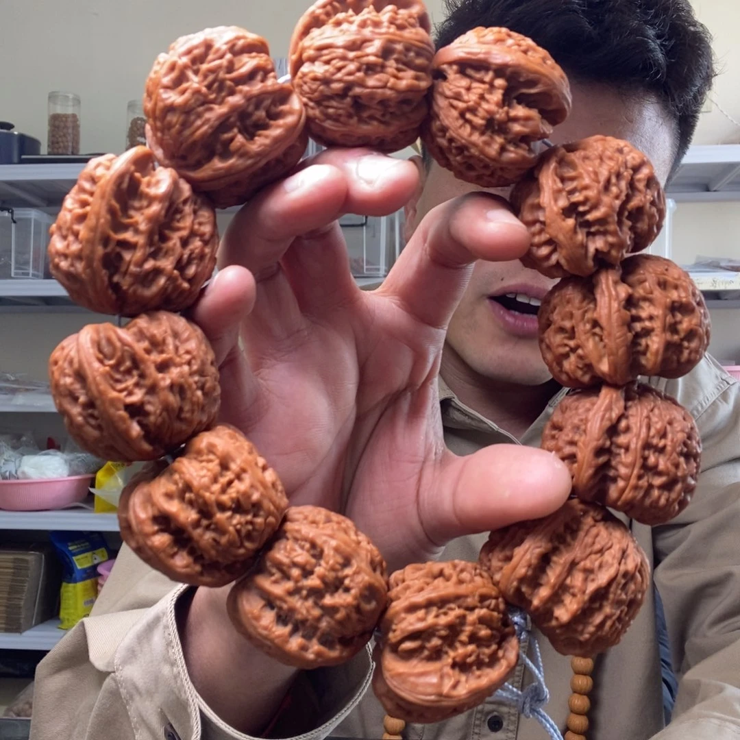 桃核吊坠白狮子麻核桃手持40福利价