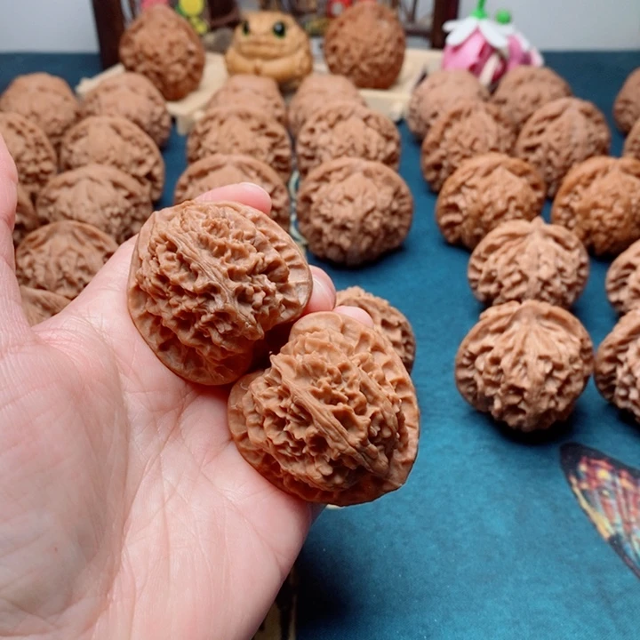 青***鸟文玩核桃把件苹果园40