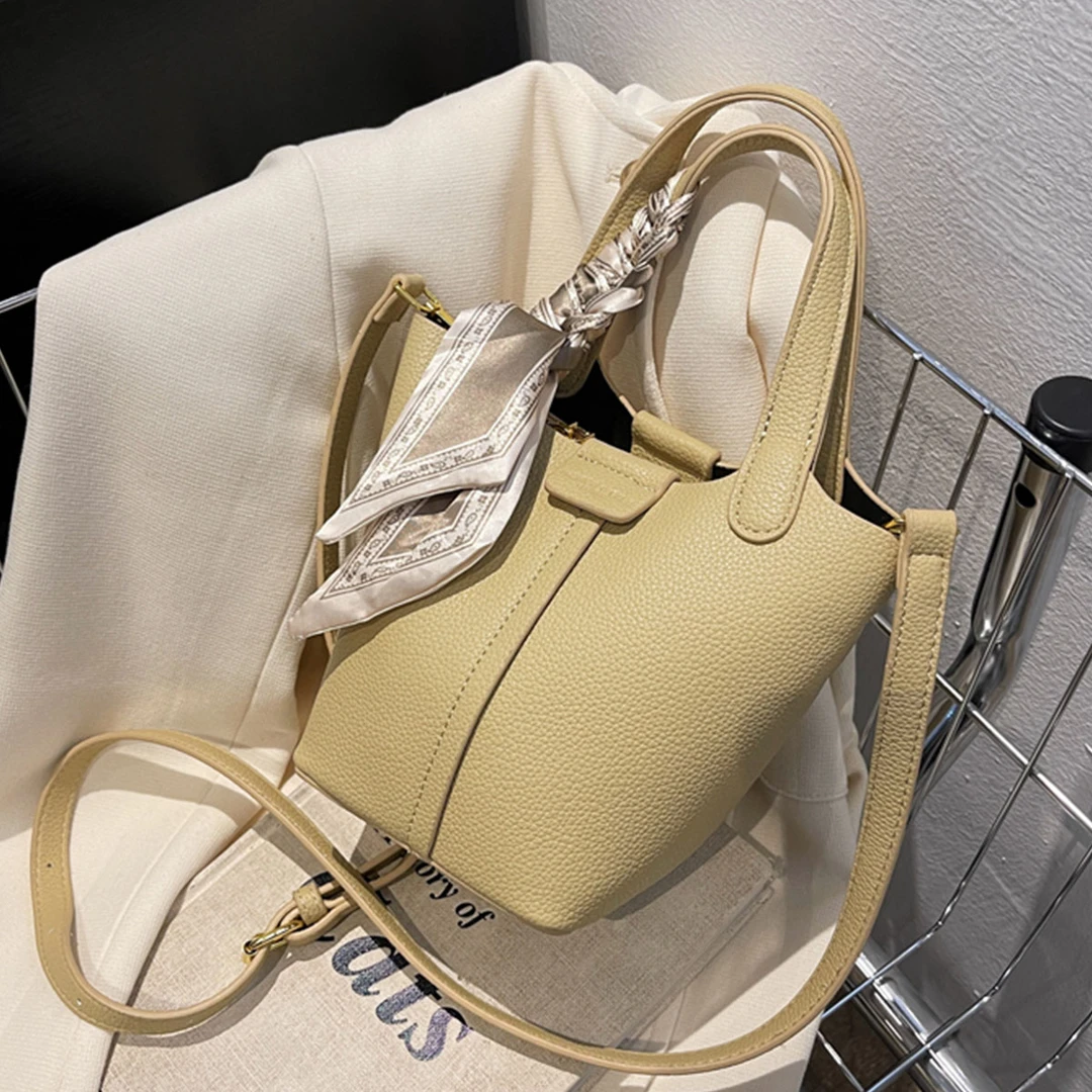 韩版潮流手提水桶包女2025新款早秋小众时尚单肩包简约休闲斜挎包