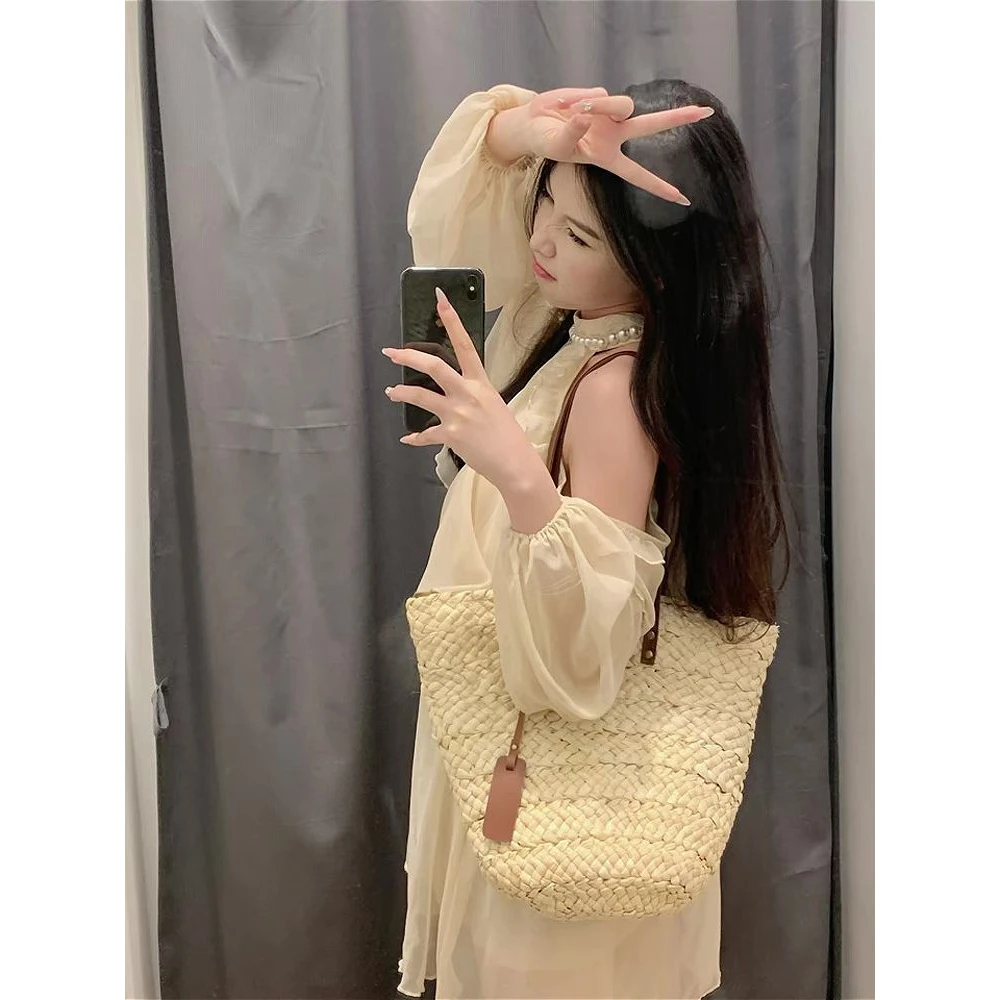 法式重工珍珠露肩挂脖连衣裙女2025夏季新款甜美温柔风小个子短裙