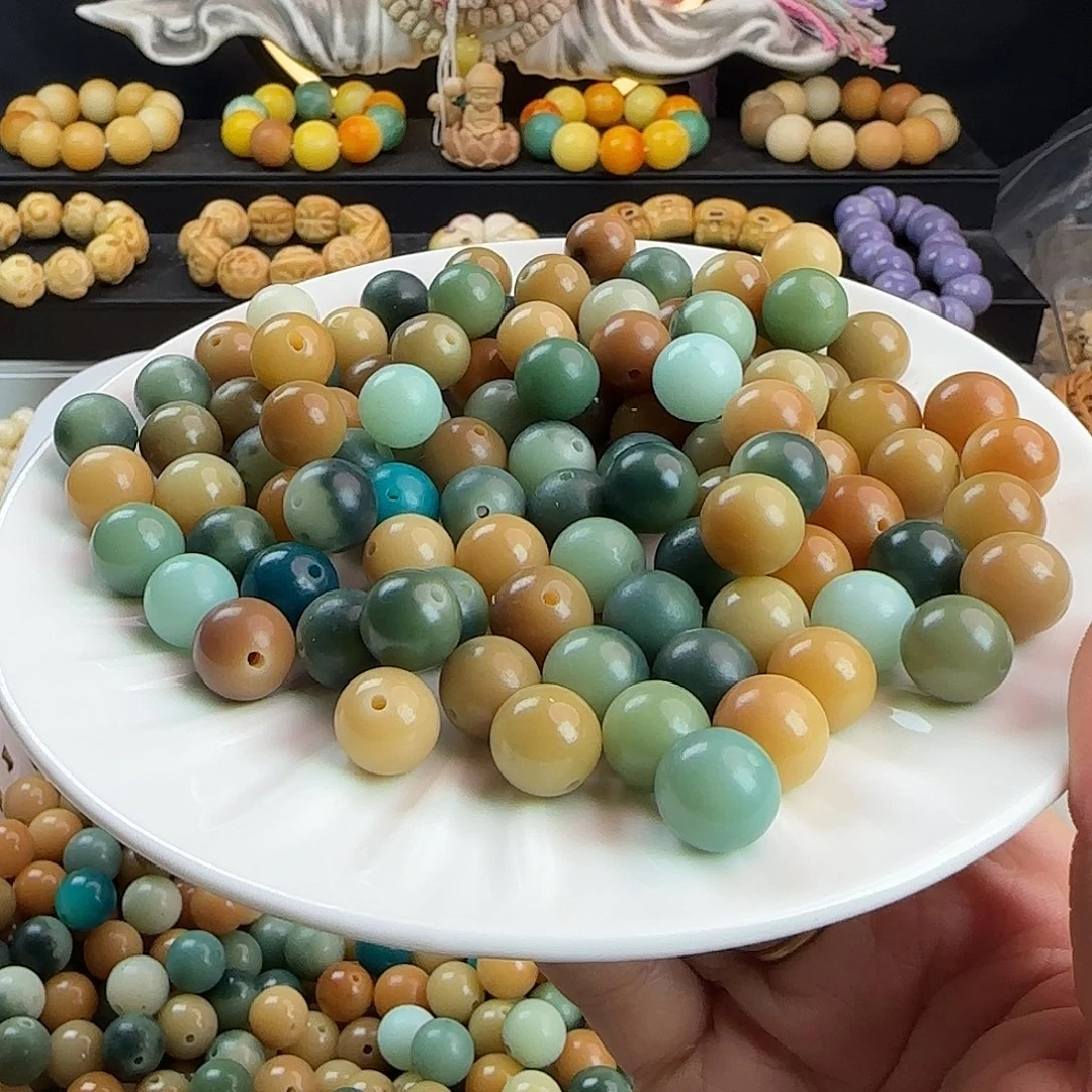手串菩提根/象牙果微瑕卡12雀羽多宝圆1000颗