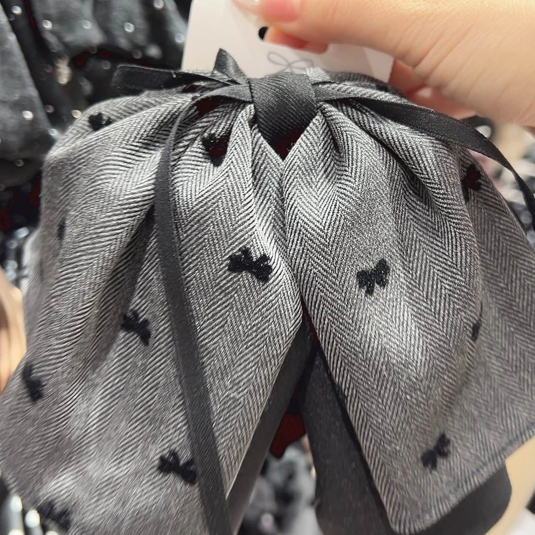 皮质铁合金灰色蝴蝶结马尾抓