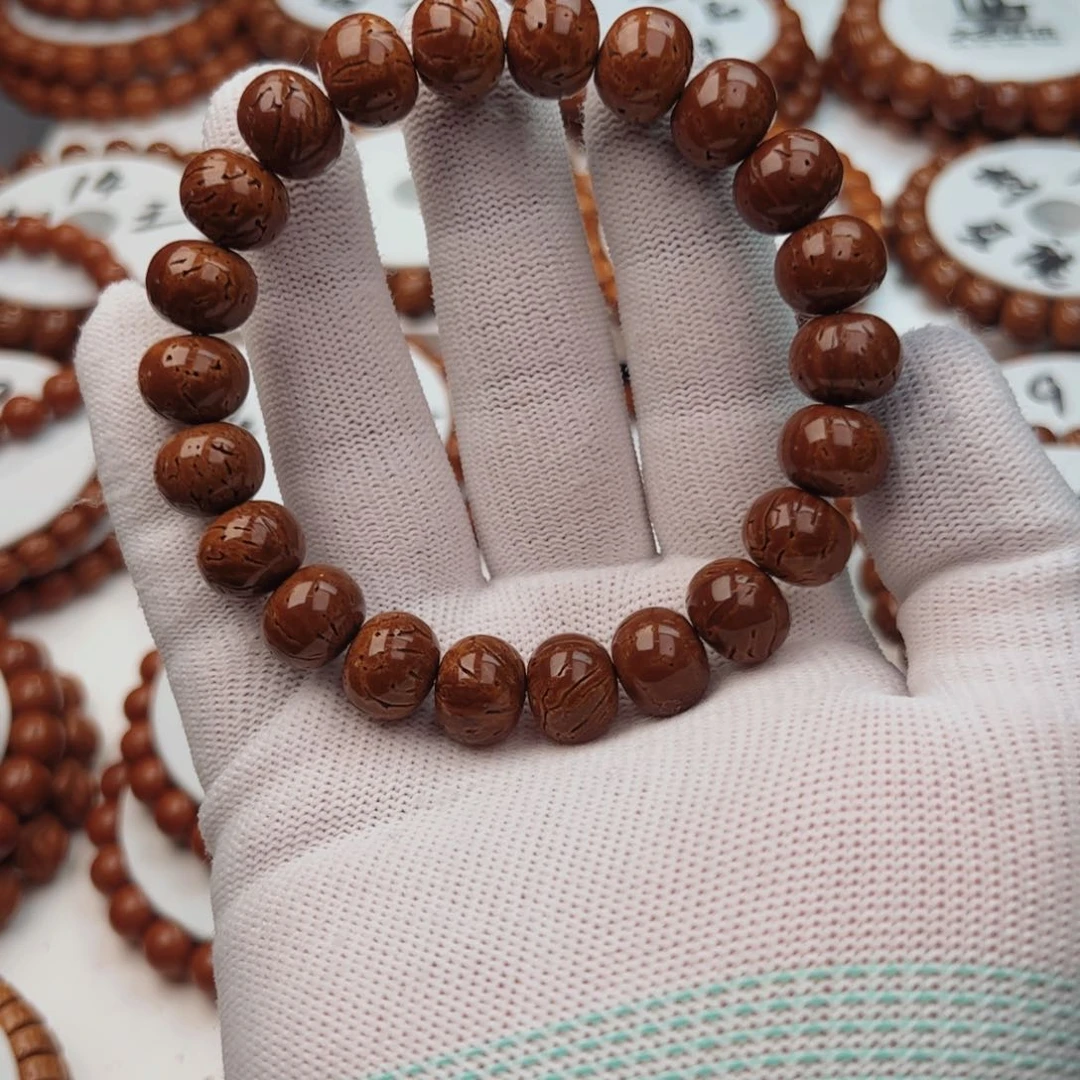 桃核手串落*俗桃核手串