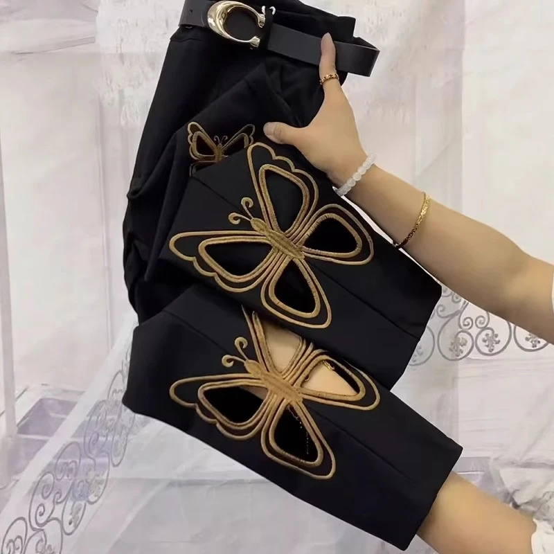 黑色镂空刺绣牛仔裤女2025夏季新款高腰显瘦复古直筒九分烟管裤子