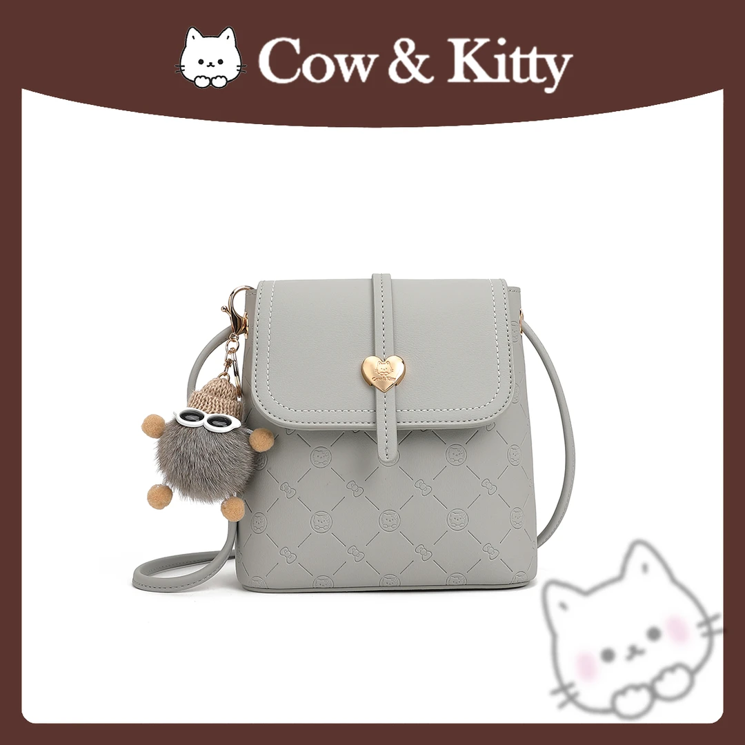 Cow&Kitty/通勤布偶桶包手提单肩斜挎8002灰