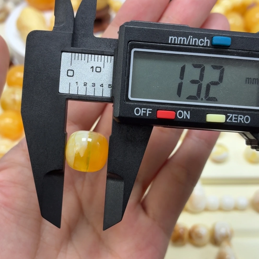 琥珀未镶嵌珠宝奇石焦皮金橘白溶洞老型13mm