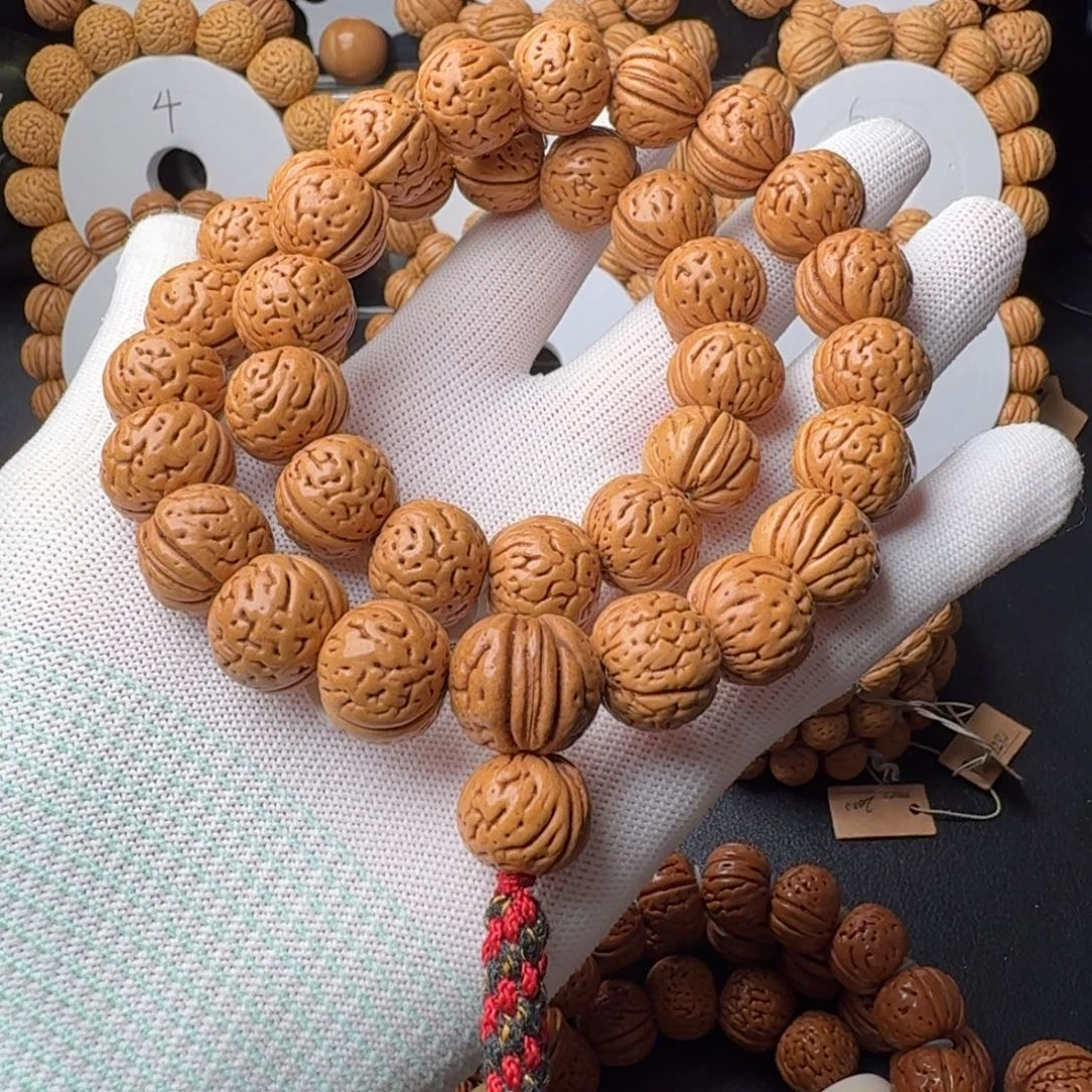 桃核手串盘锦野生大肌肉半挂