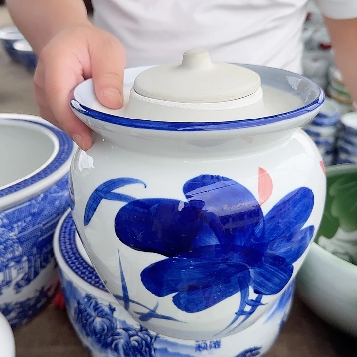 瓷片直径16厘米高度18厘米…………