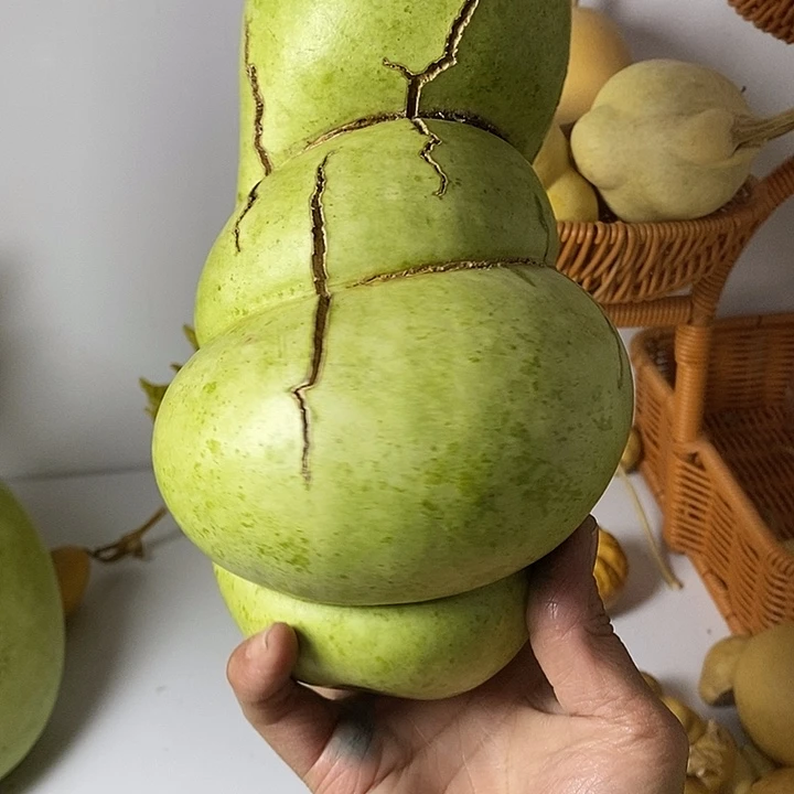 芷***。异形葫芦手把件葫芦