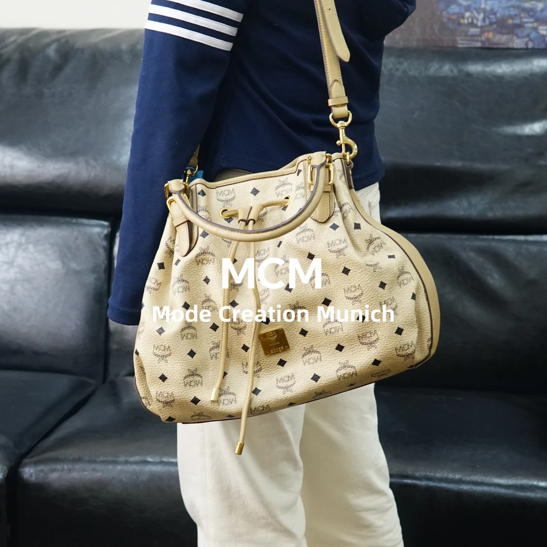 95新 MCM 米色抽绳斜挎包/MH01409511/9511