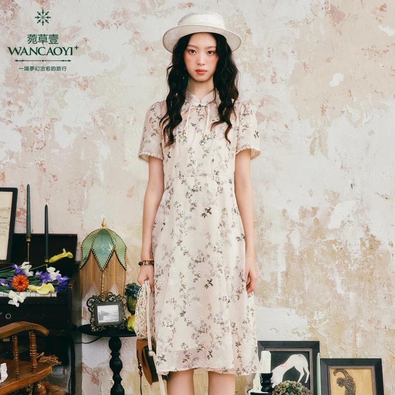 菀壹2025夏季新中式印花泡泡袖显瘦气质连衣裙Q06950421