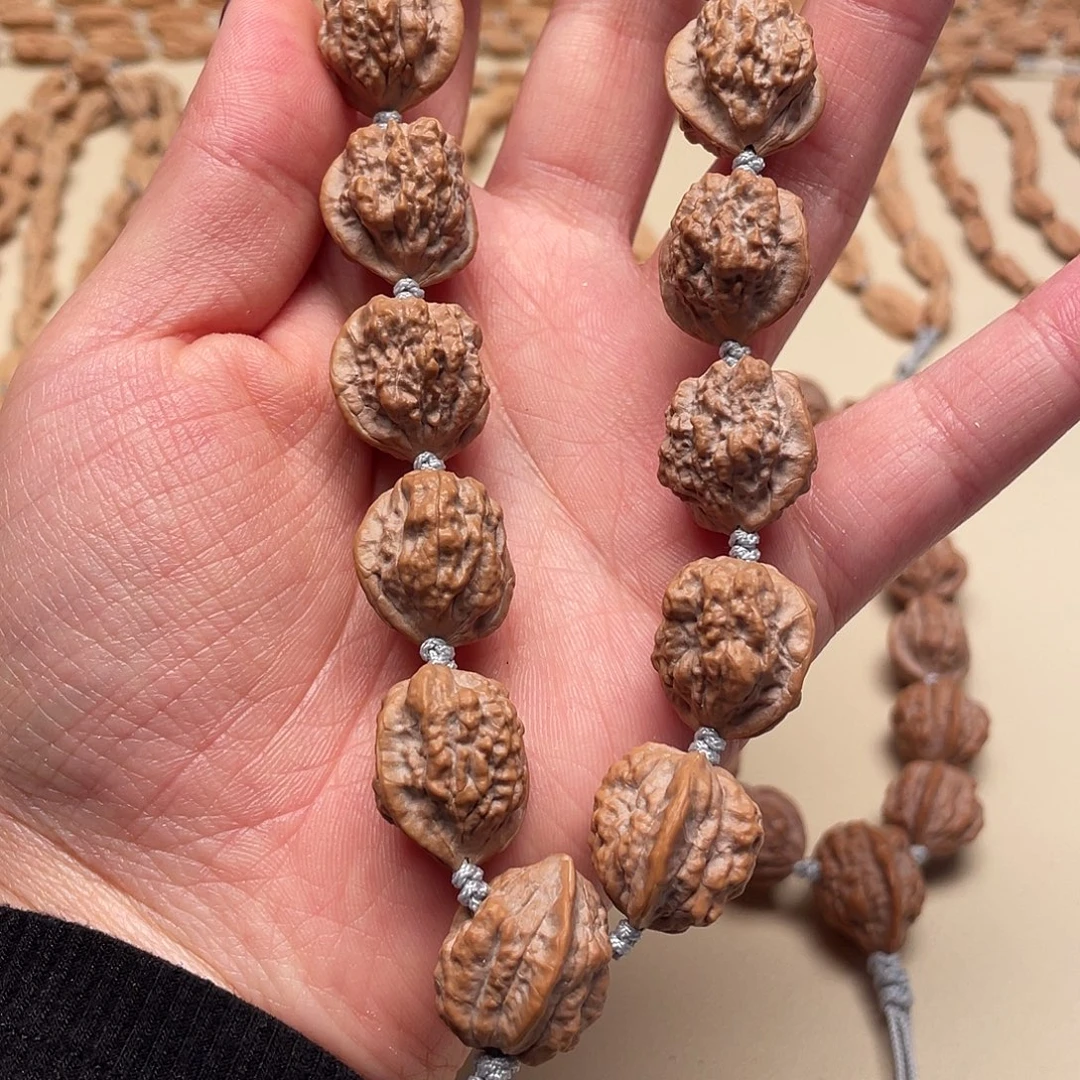 蓝***湾桃核手串蛤蟆头手串