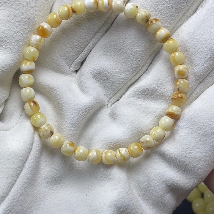 琥珀未镶嵌珠宝奇石沁色奶豆5.5mm