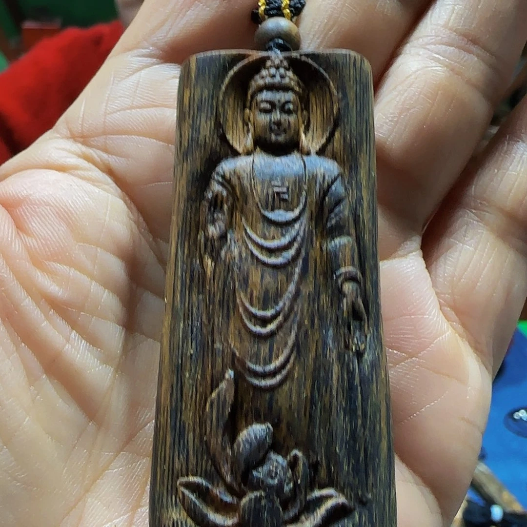 沉香碎屑沉香海南白奇乌身老料大日如来带绳10克