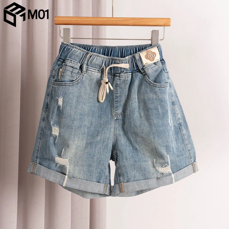 M01松紧腰破洞翻边牛仔短裤女宽松弹力夏季2025新款大码显瘦热裤