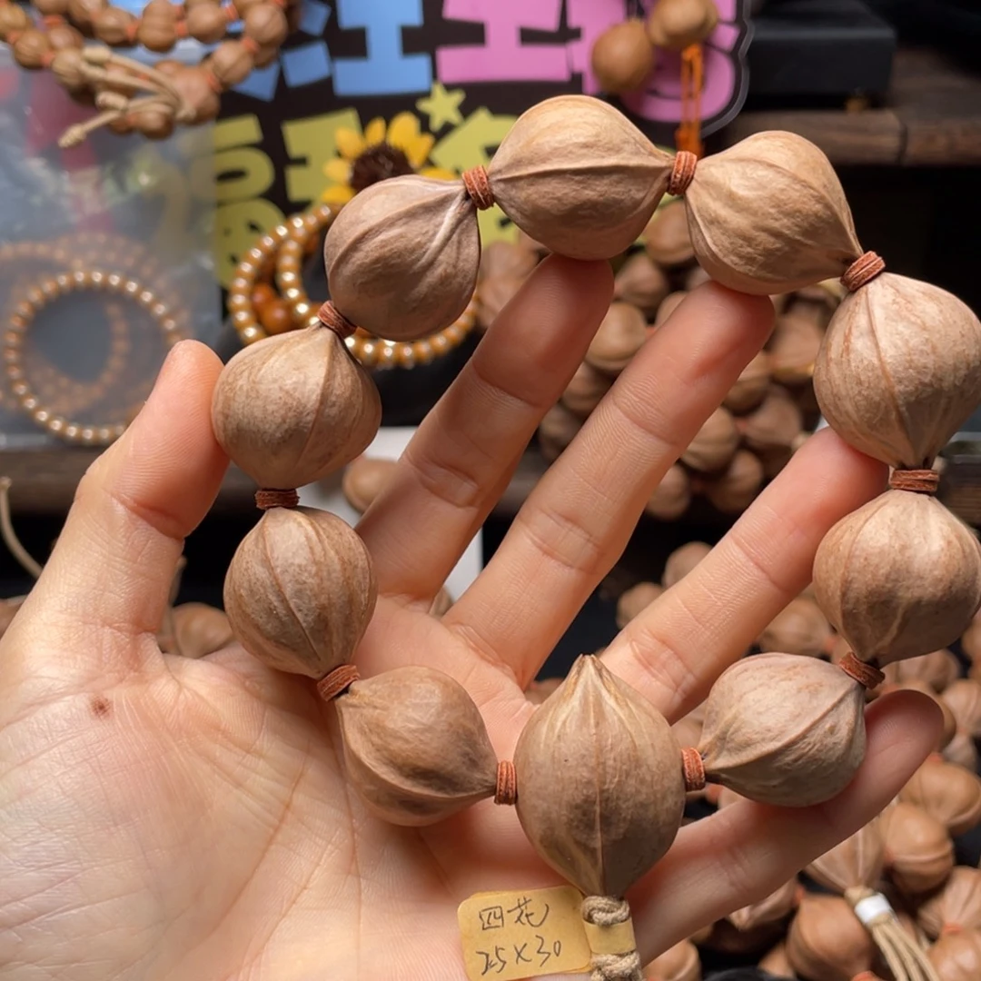 保***航吊坠橄榄核2530四花铁核