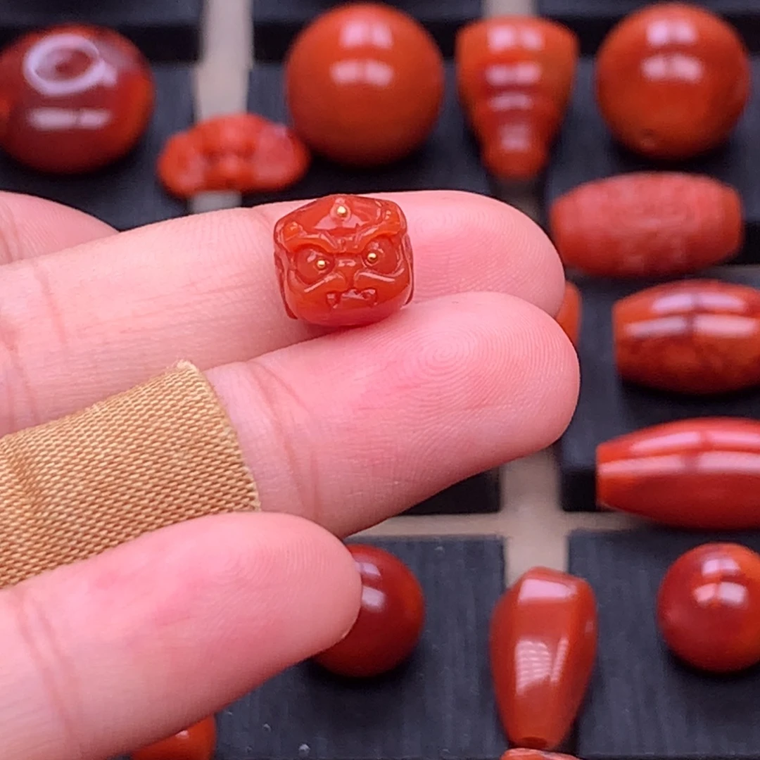 南红玛瑙未镶嵌川料原矿精工醒狮头9.9mm